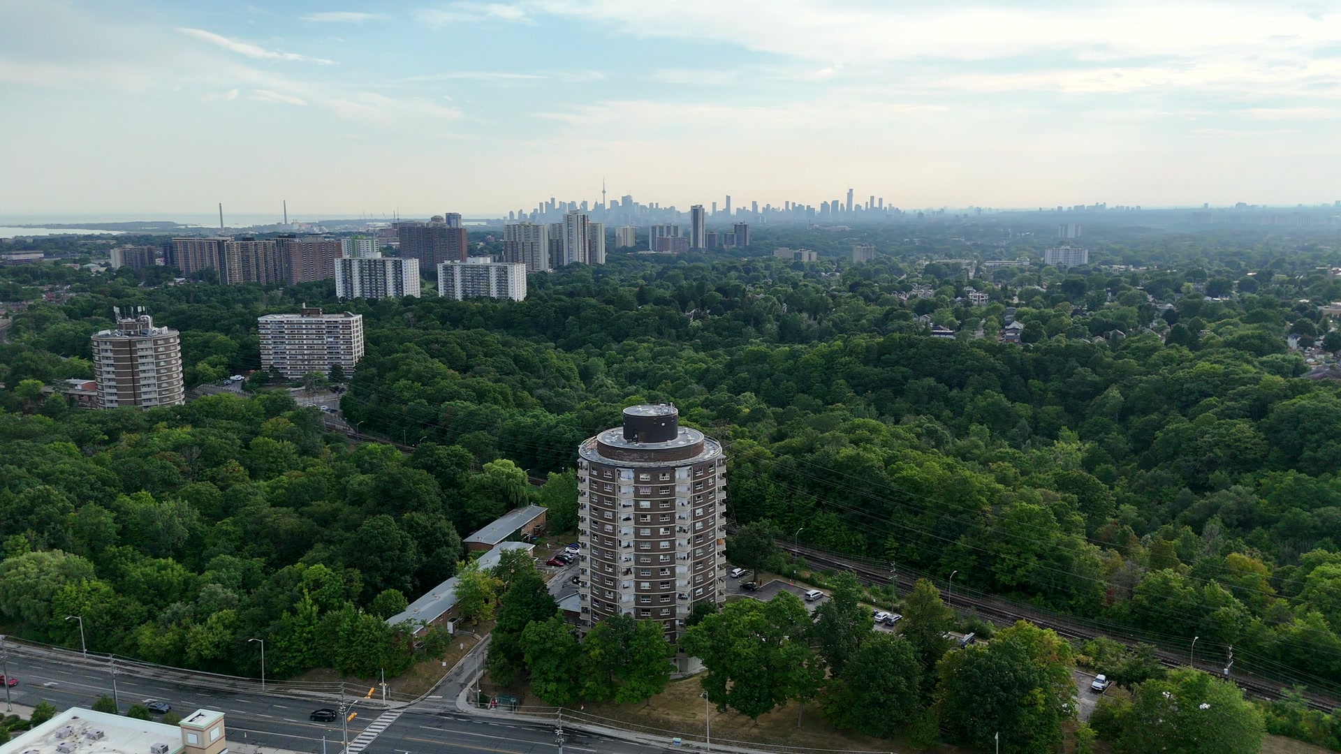 Aerial view of 682 Warden Avenue with the Toronto skyline - Trinity Roofing